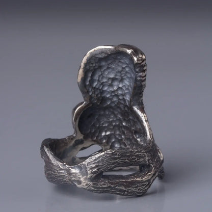 Barn Owl Ring in Sterling Silver with large spread wings, sitting on a branch, intricately hand-carved, back view.