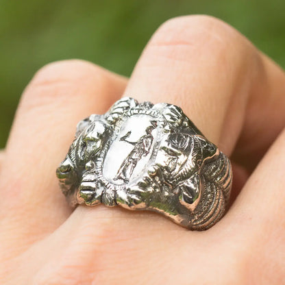 Roman Etruscan antique style sterling silver ring with lion details and goddess engraving, handmade artisan statement piece.