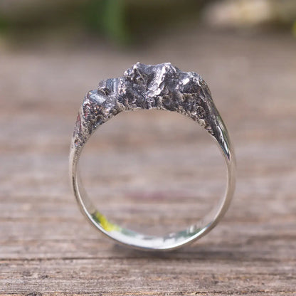 Sterling silver mountain range ring with textured rock design for women.