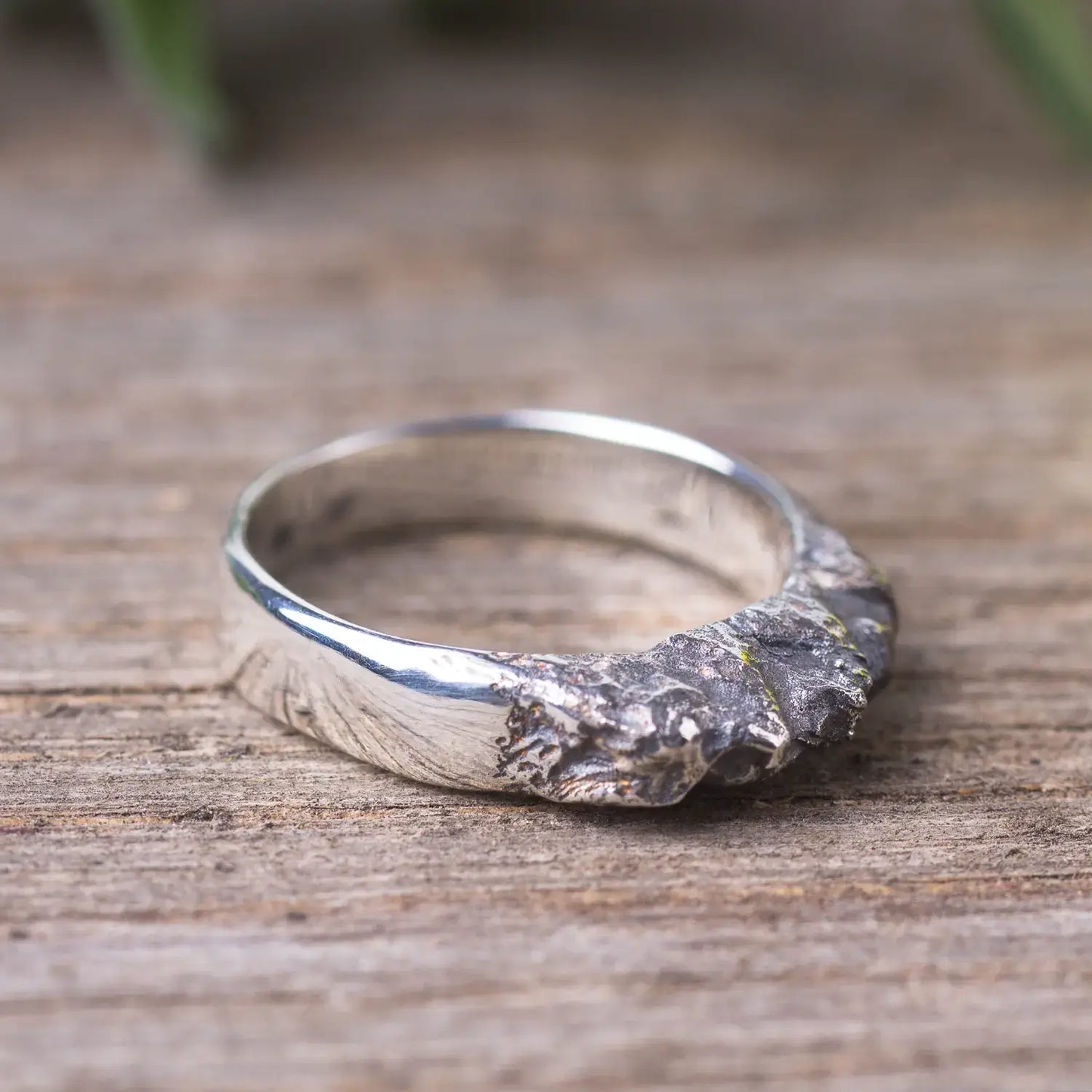 Sterling silver mountain range ring with textured rock design for women, showcasing organic textures and polished band.