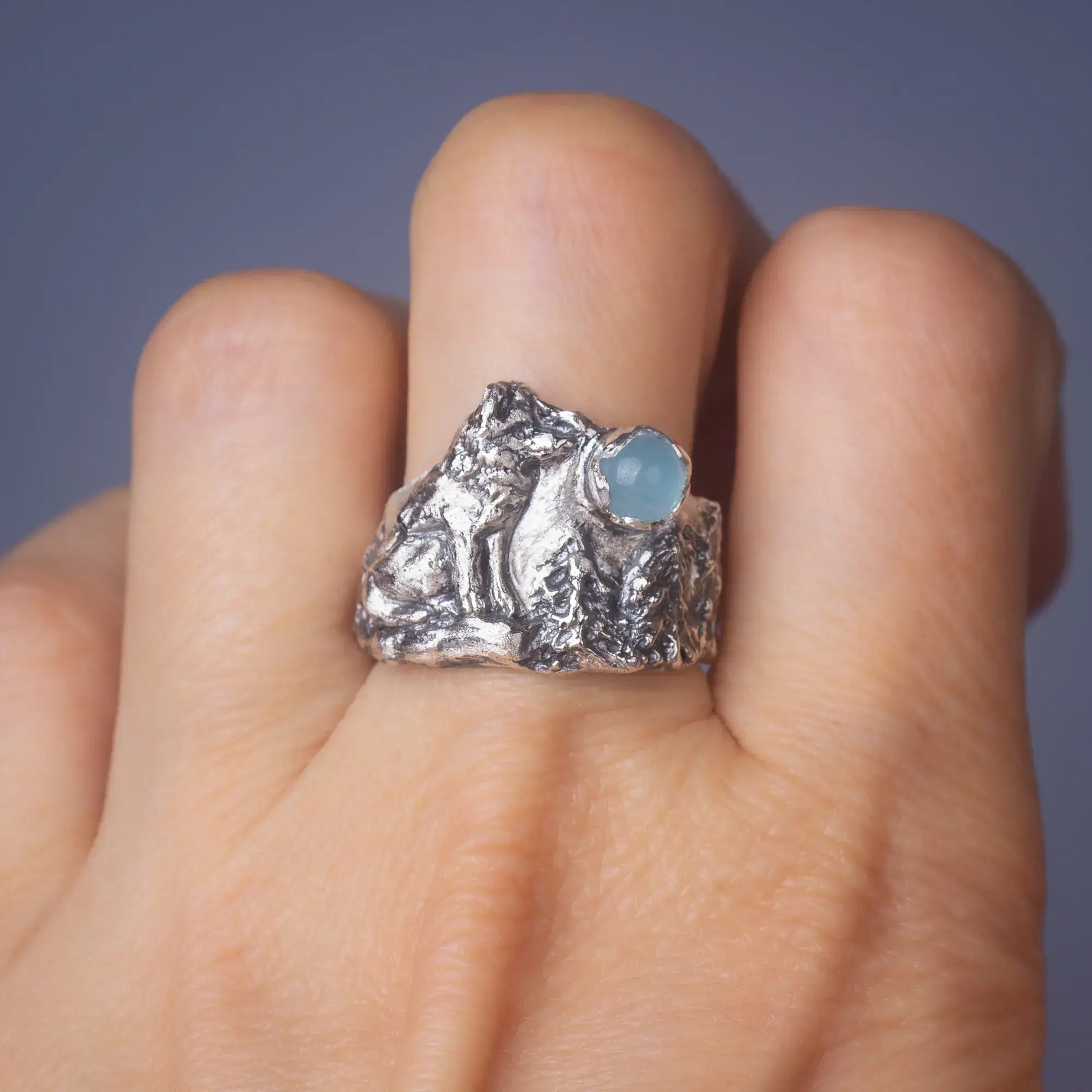  wolf ring in silver with aquamarine Gemstone back view worn on finger