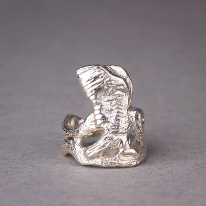 Sterling silver barn owl ring showcasing intricate woodland design, perfect for nature lovers and spirit animal enthusiasts.