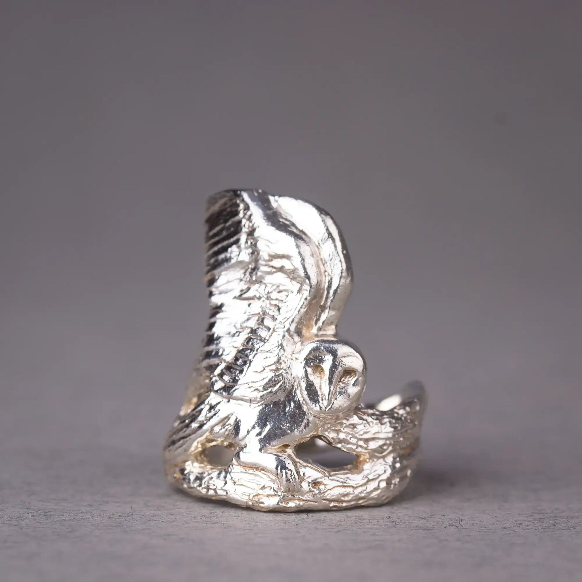 Sterling silver barn owl ring showcasing intricate handcrafted details for a witchy, nature-inspired statement piece.