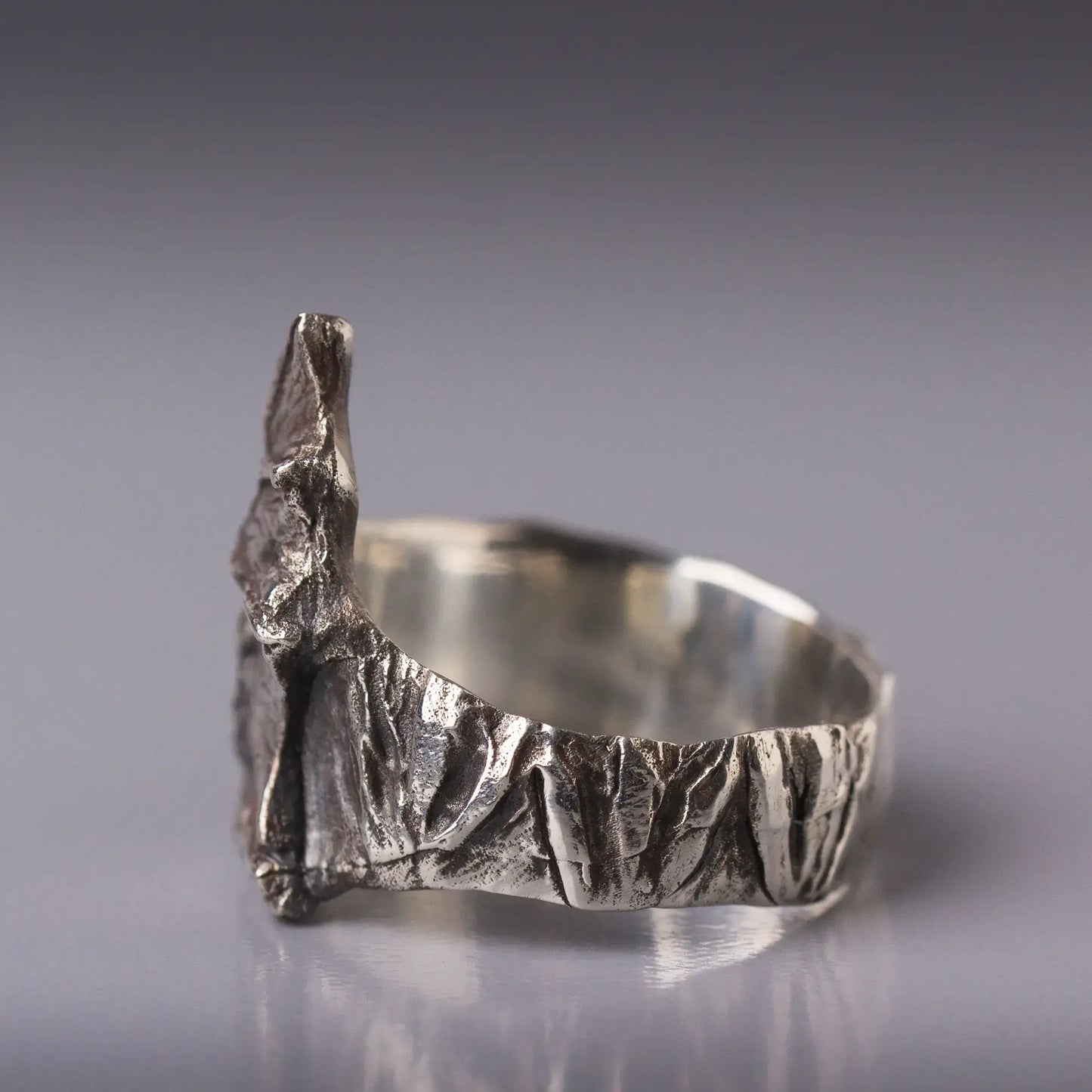 Sterling silver bat ring with detailed bat wings, a unique animal ring, featuring a gothic and nature-inspired design.