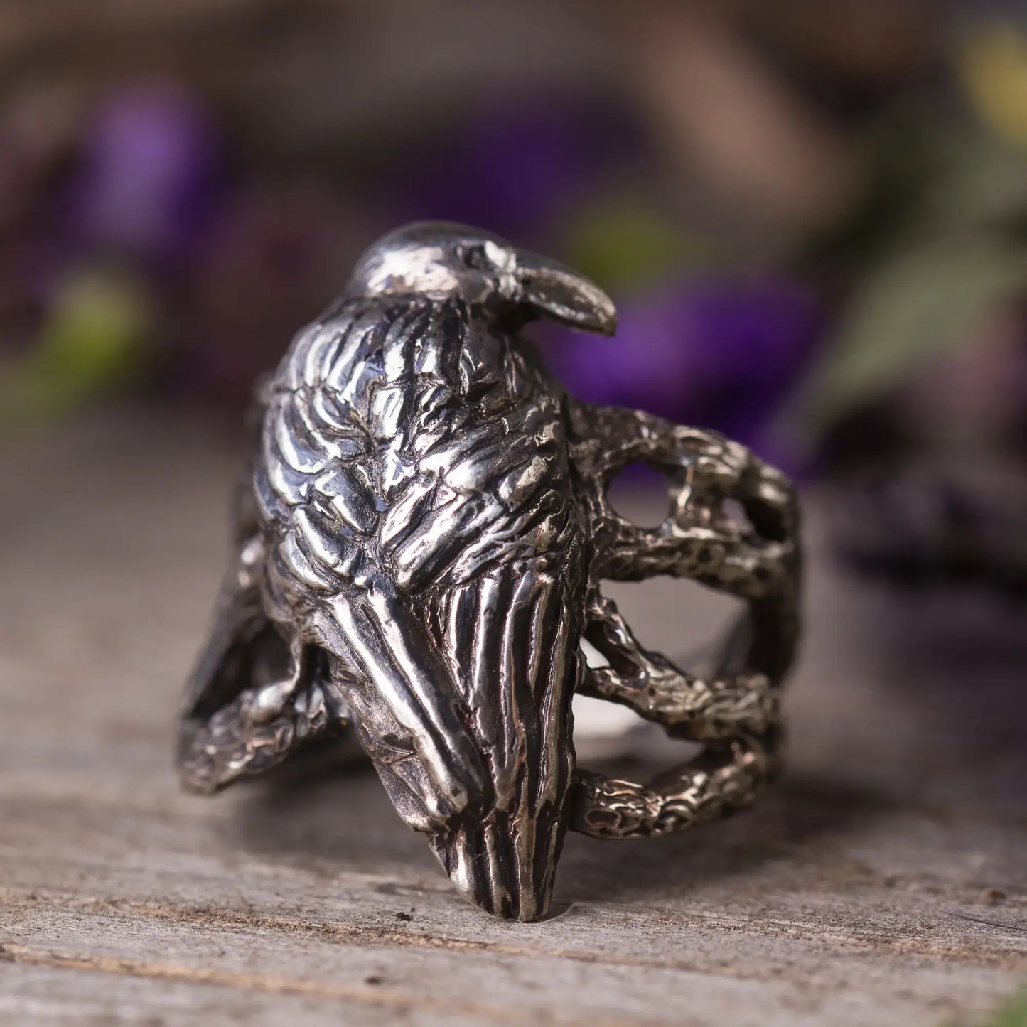 Handcrafted sterling silver crow ring with intricate twig design, perfect for nature lovers and mystical style enthusiasts.