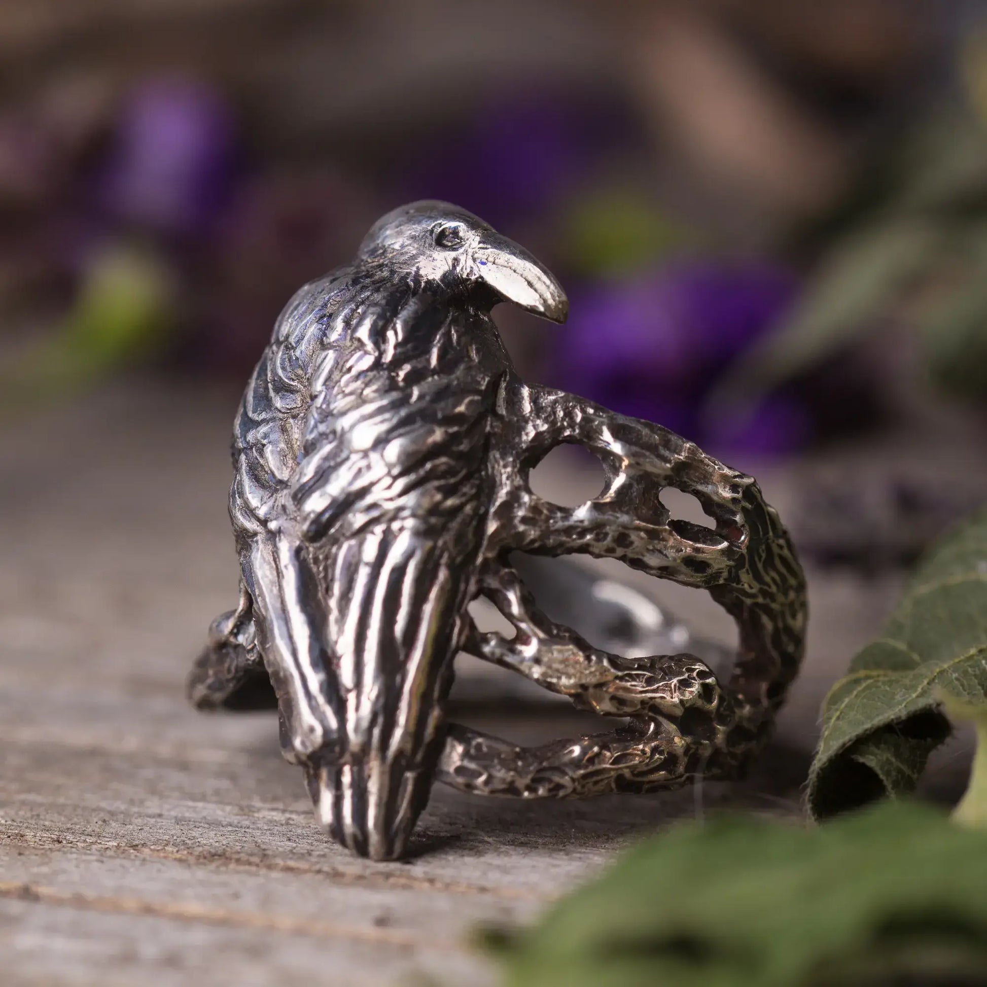 Sterling silver crow ring, intricately designed with a crow perched on branches, perfect statement for nature and witchy style lovers.