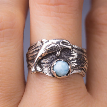 dolphin ring in silver with larimar gemstone on the finger