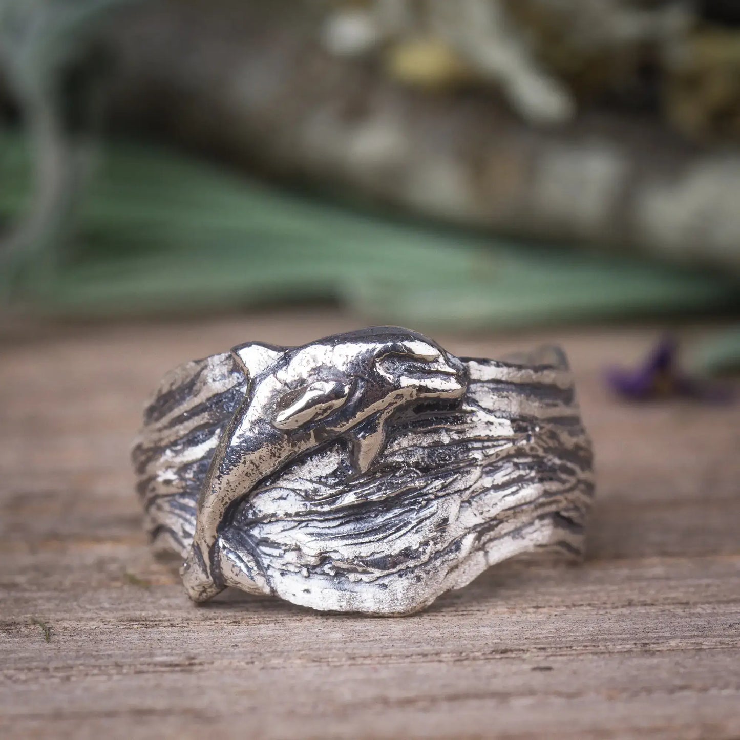 Silver dolphin wide band ring with wavy design, ocean-inspired sea life ring.