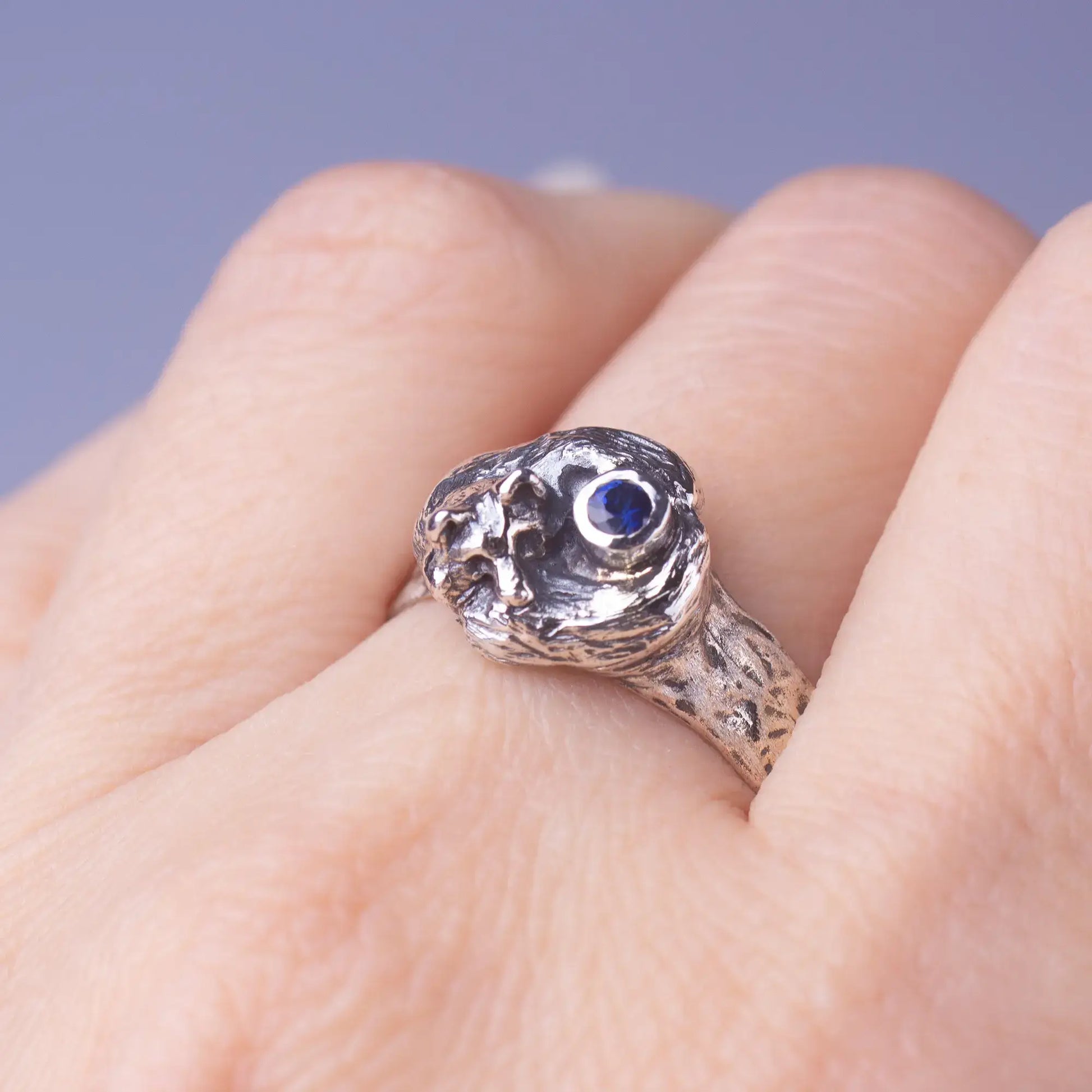 fox silver ring with blue sapphire, top view