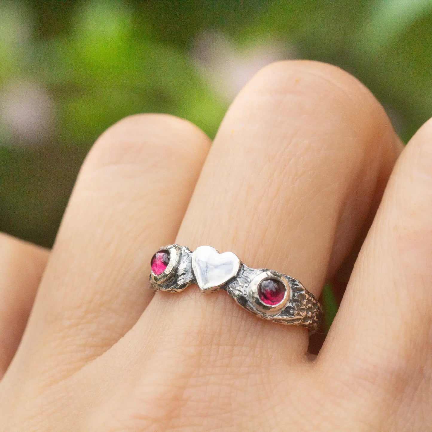 Heart Ring in Silver and Garnet, nature twig design, on the finger