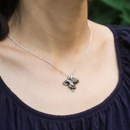 Hummingbird pendant in Silver worn on model