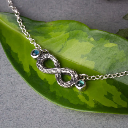 Infinity Twig Silver Pendant necklace with Green Blue Tourmaline, Silver Branch Pendant, side view