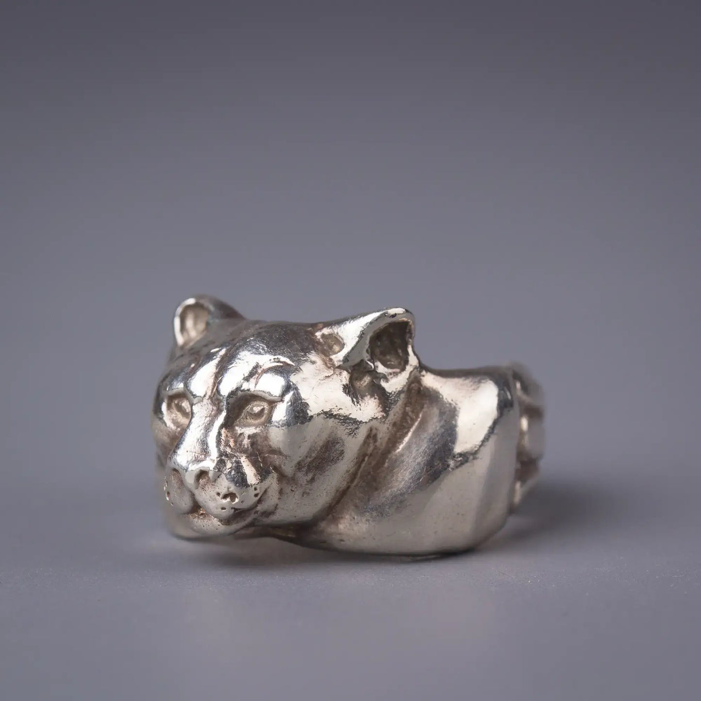 Sterling silver handcrafted Mountain Lion Cougar Ring, symbolizing strength and courage, a unique wildlife spirit animal jewelry piece.