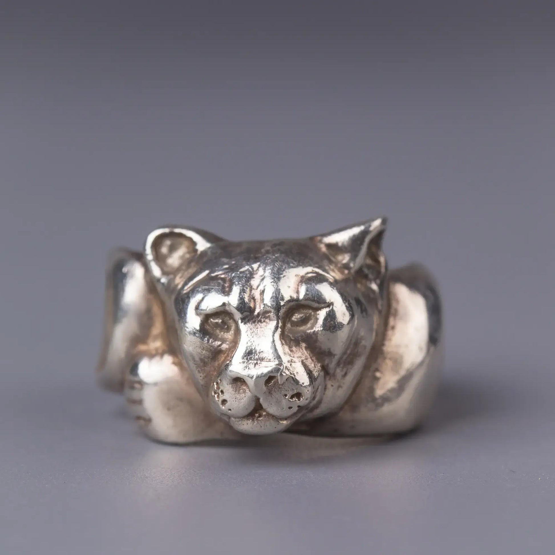 Sterling silver handcrafted mountain lion cougar ring, nature spirit animal jewelry symbolizing strength and courage.