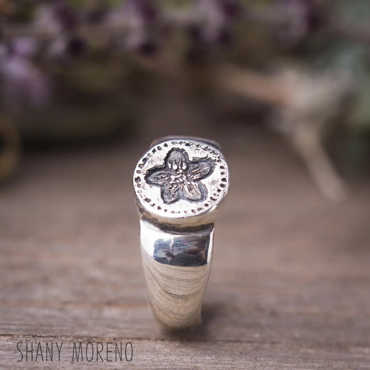 Sterling silver ring with hand-carved scarlet Pimpernel flower, showcasing antique style and dainty design, perfect for nature lovers.