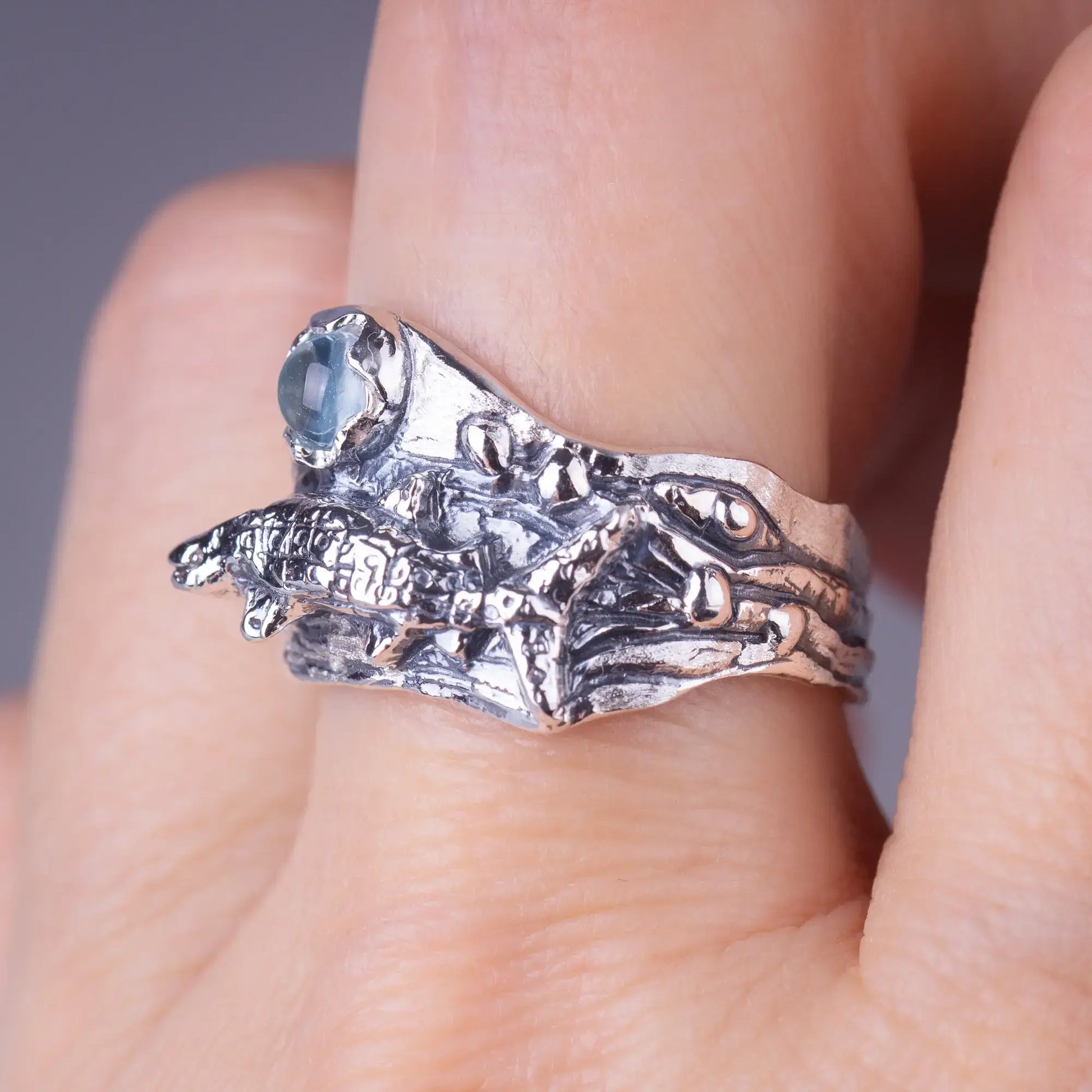 whale shark ring in silver, on the finger, side view