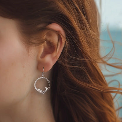 Whale Earrings in Sterling Silver, worn on model