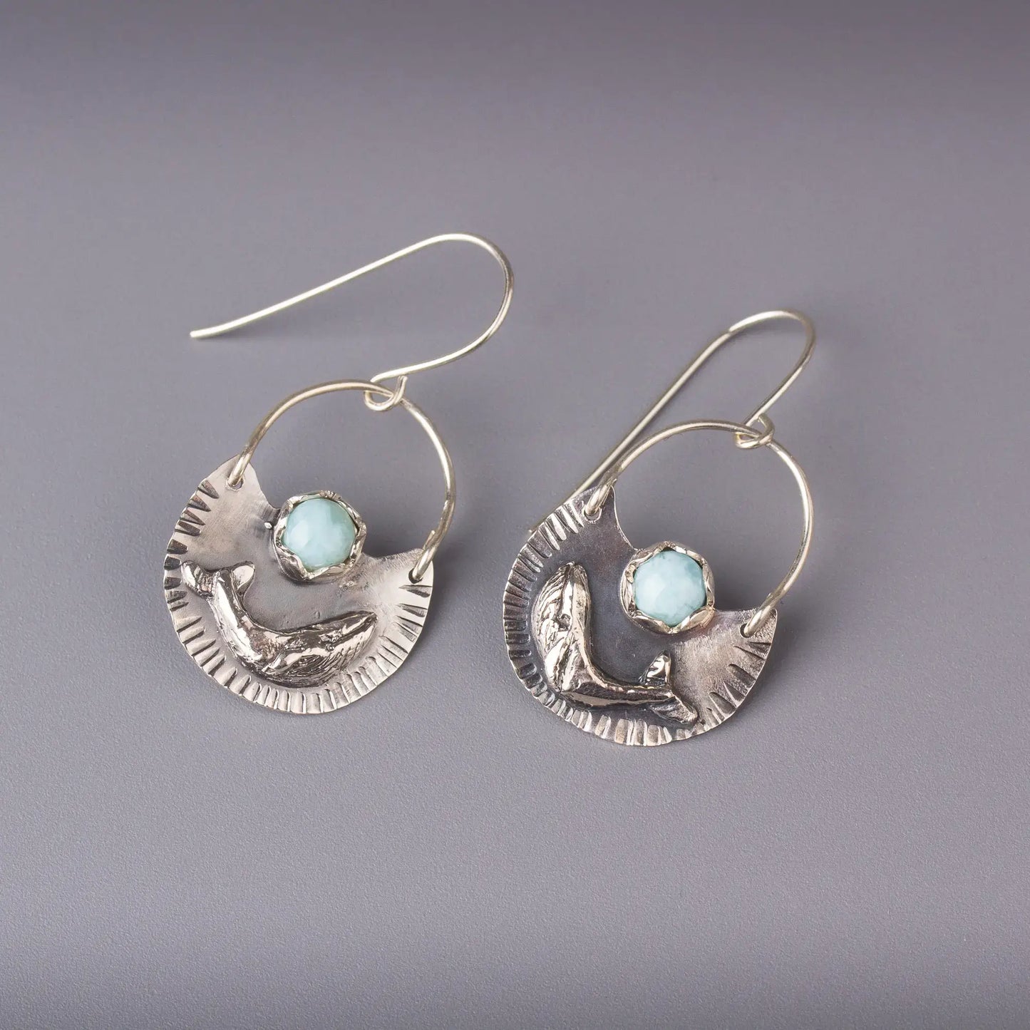 Silver humpback whale dangle earrings with larimar gemstones, ocean style statement jewelry.