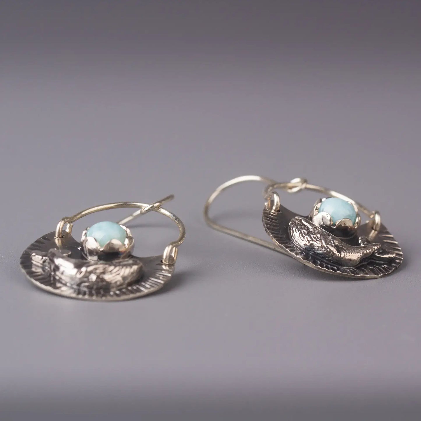 Silver humpback whale dangle earrings with Larimar gemstones, ocean style statement jewelry.