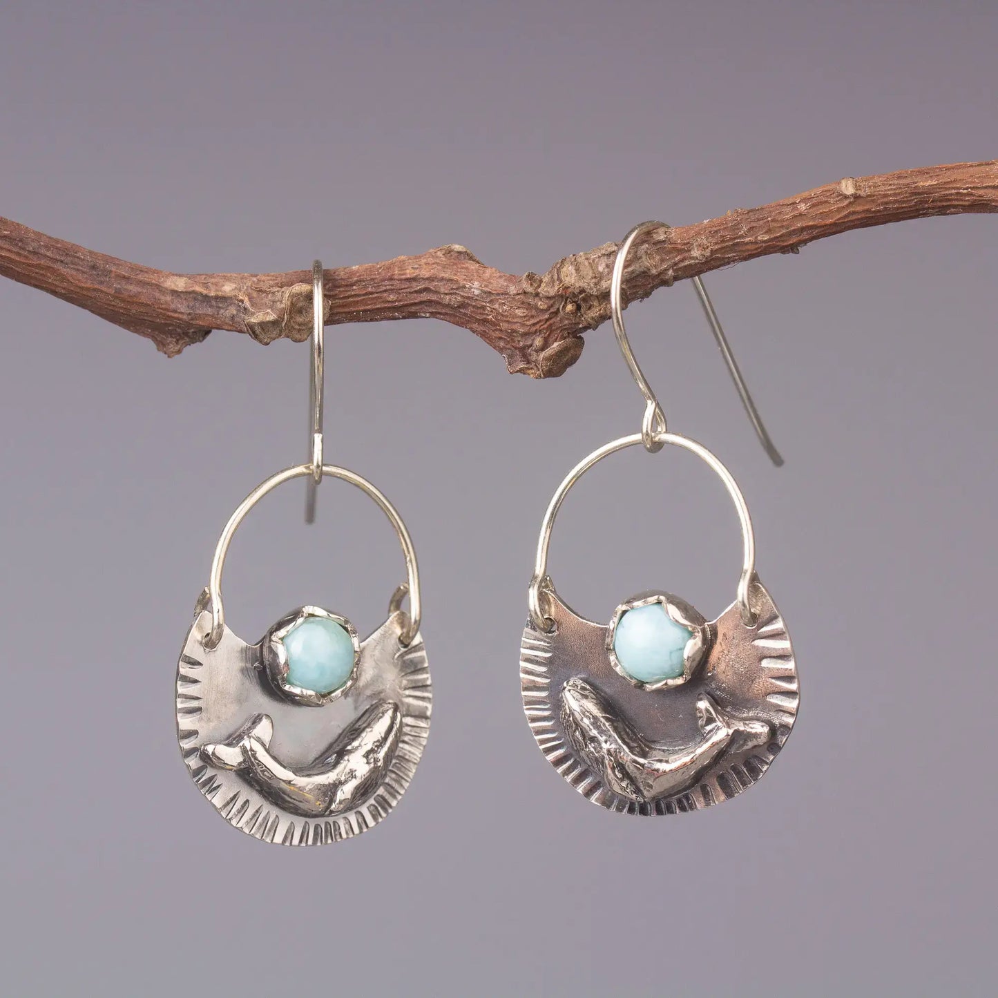 Humpback whale dangle earrings in silver with Larimar gemstone, ocean style statement earrings on rustic branch.