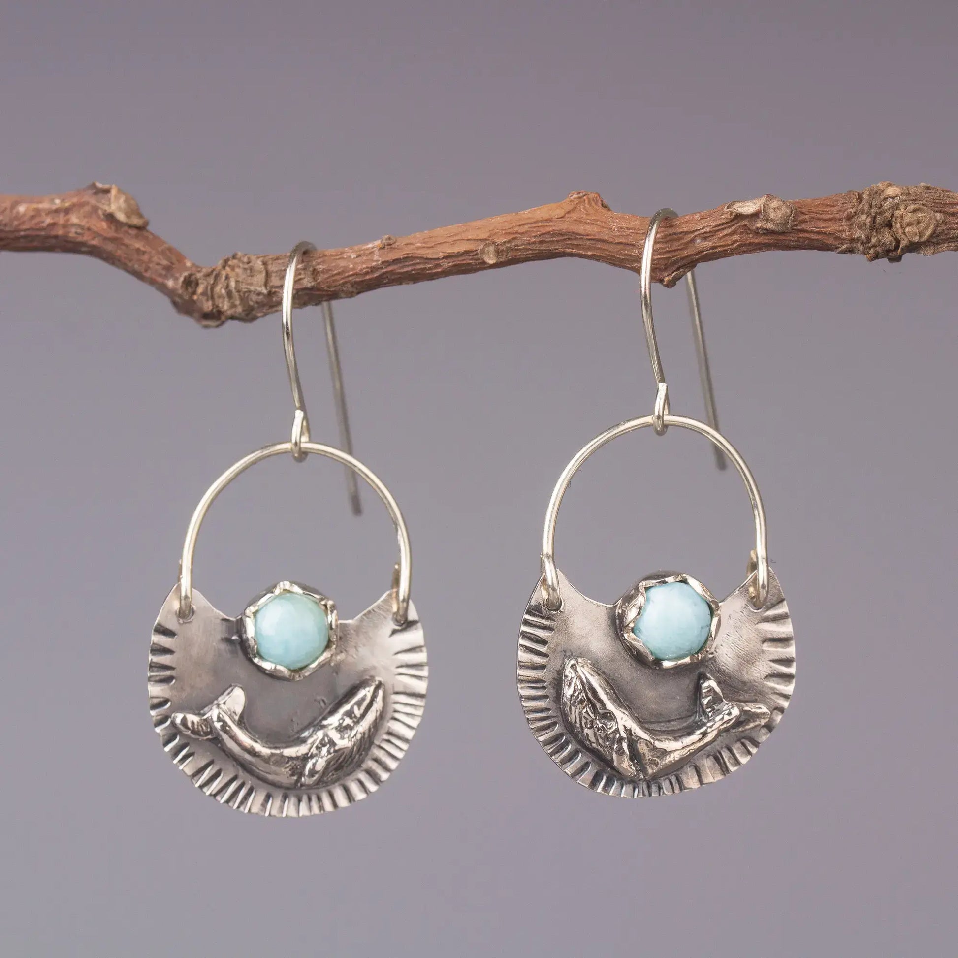 Silver humpback whale dangle earrings with Larimar gemstones, ocean style statement jewelry.