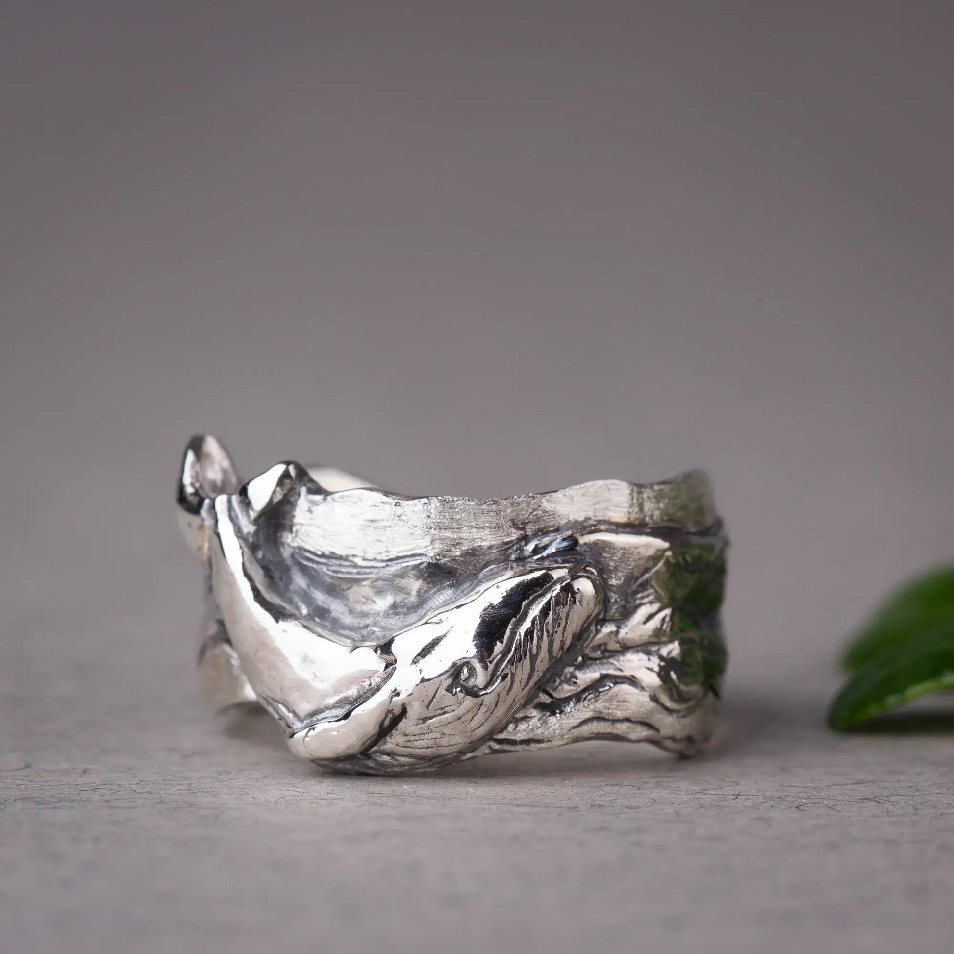 Sterling silver whale ring featuring detailed humpback whale design on a wide band, ocean-inspired statement jewelry gift.