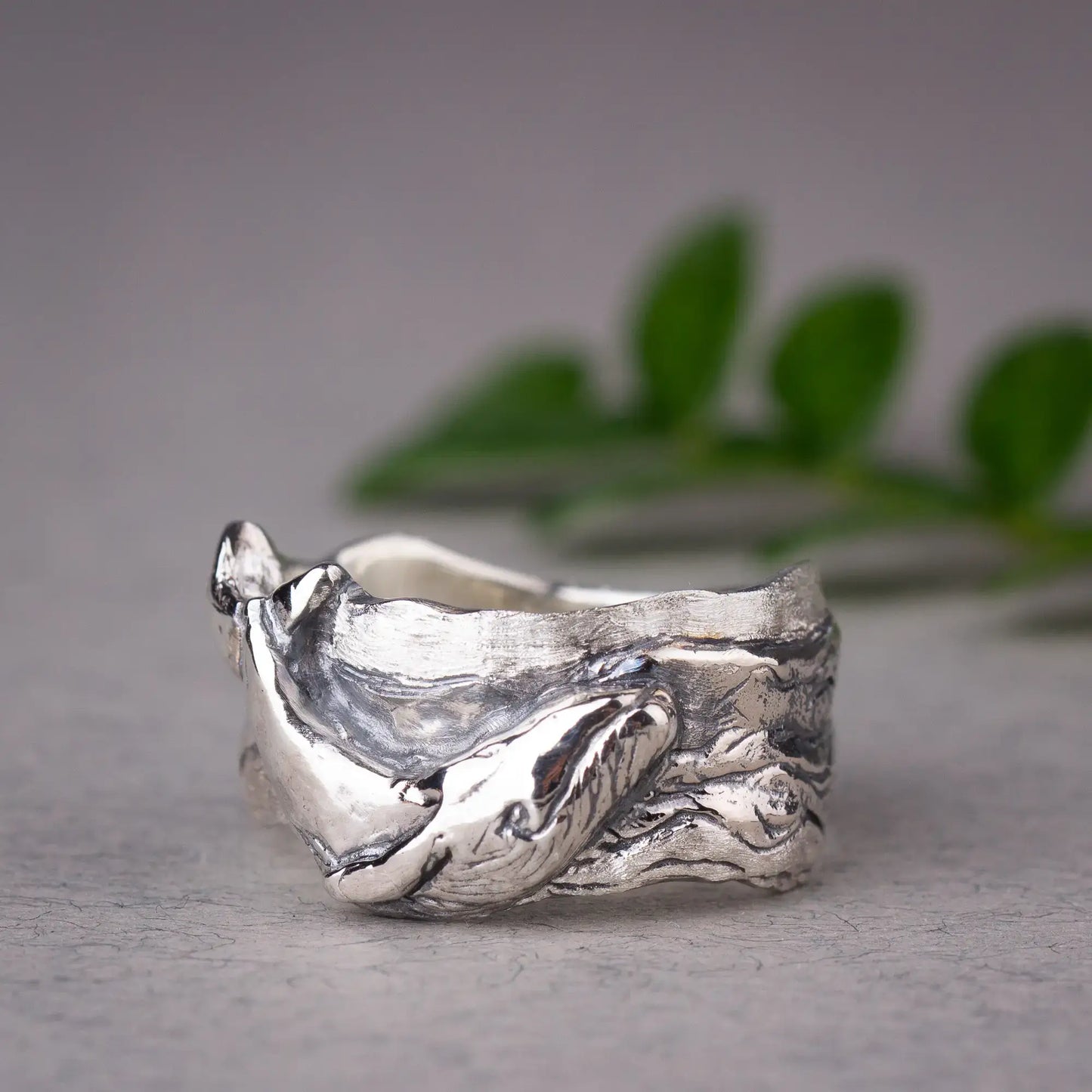 Sterling silver whale ring featuring a detailed humpback whale on a wide band, perfect ocean jewelry gift for sea animal lovers.