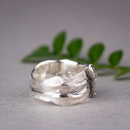 Sterling silver whale ring with detailed humpback whale design, wide band ocean ring for sea lovers.