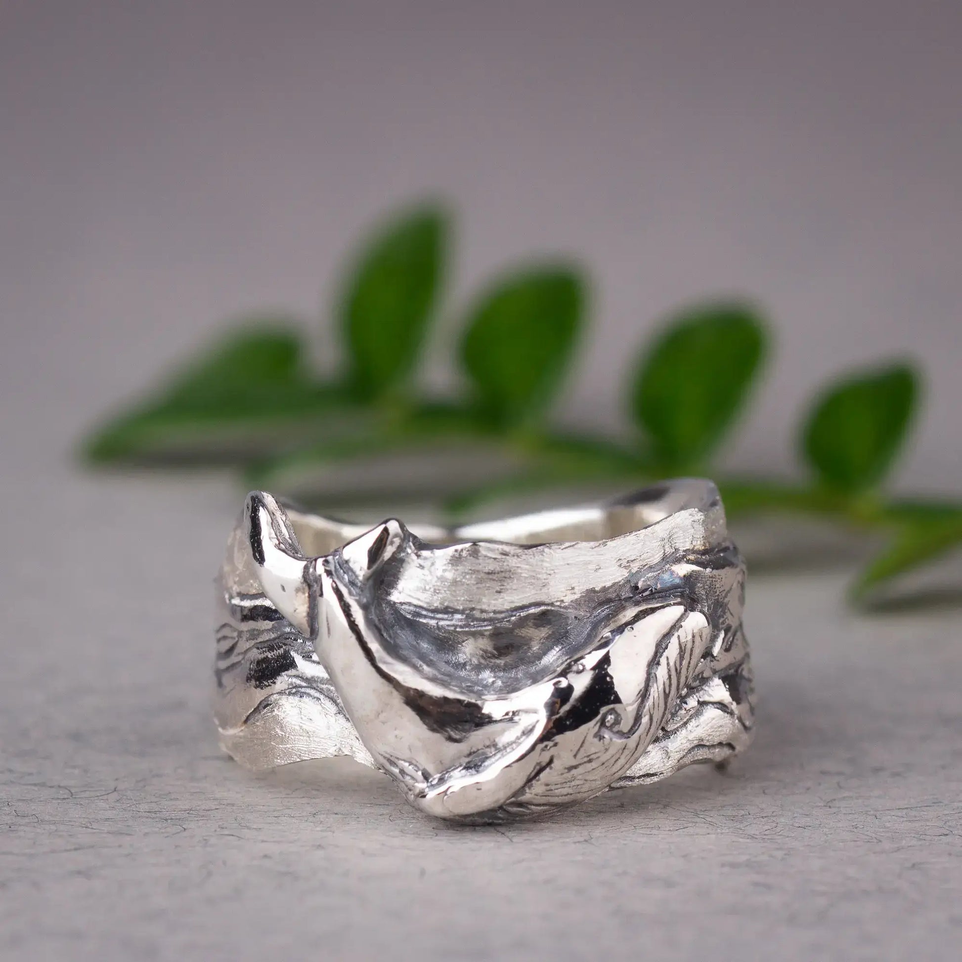 Sterling silver whale ring with detailed humpback whale design on wide band, ocean-themed statement jewelry gift