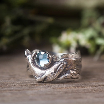 Sterling silver humpback whale ring with blue topaz gemstone and wide band, ocean statement nautical ring.